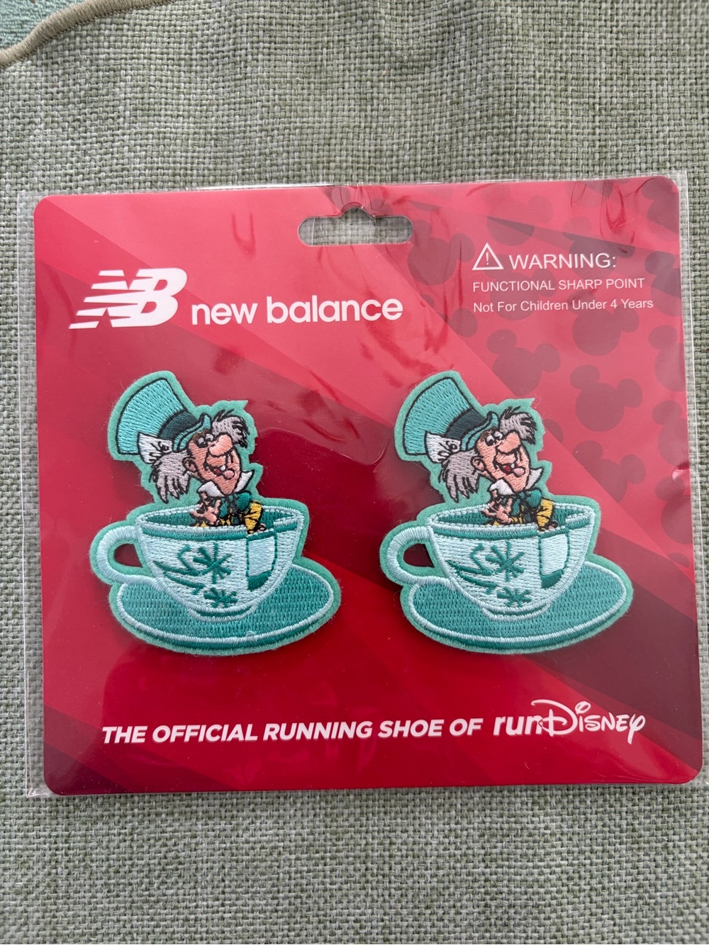 New Balance Disney Mad Hatter Alice in Wonderland Shoelace Clips in Package
